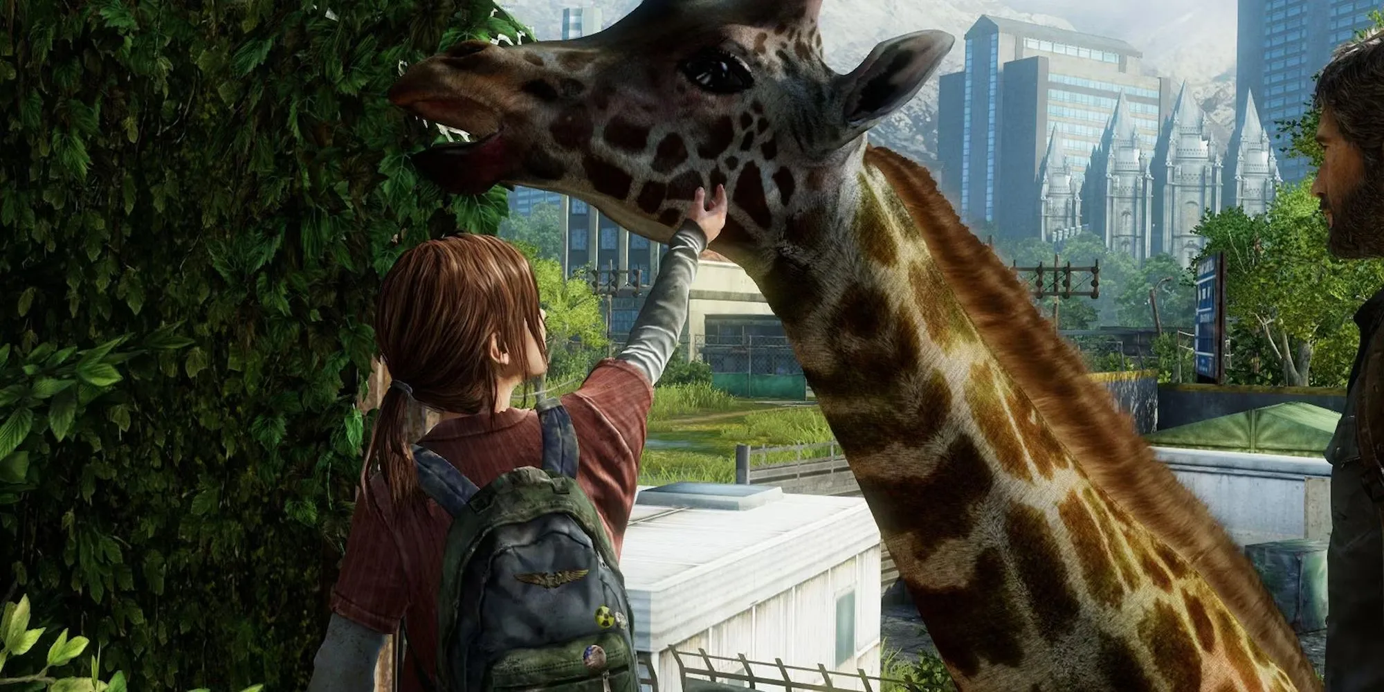 Cảnh Joel và Ellie ngắm nhìn hươu cao cổ trong The Last of Us, một khoảnh khắc yên bình hiếm hoi giữa thế giới hậu tận thế