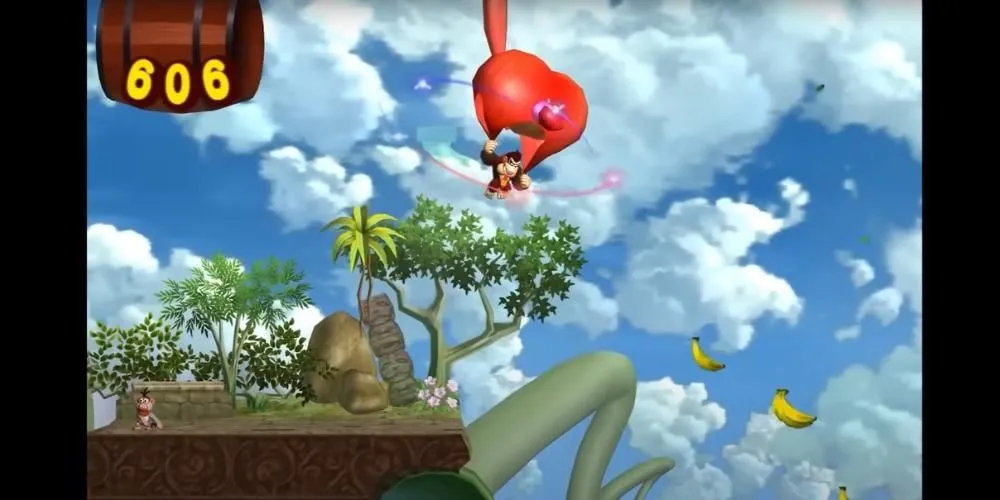 Donkey Kong đang nhảy dù giữa không trung hướng về phía đàn chuối trong Donkey Kong Jungle Beat