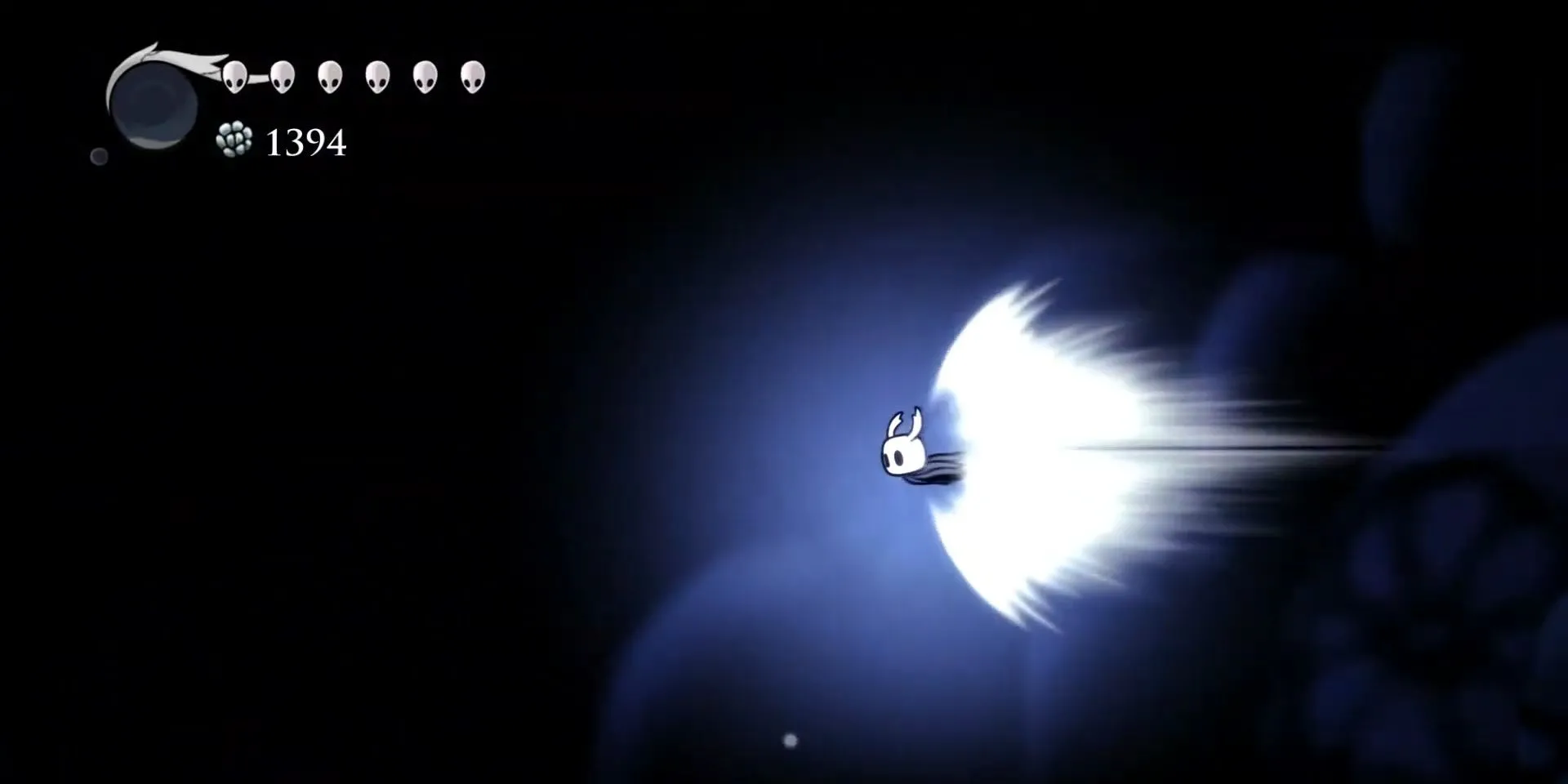Hiệp sĩ thực hiện Crystal Dash trong Hollow Knight để vượt qua chướng ngại vật