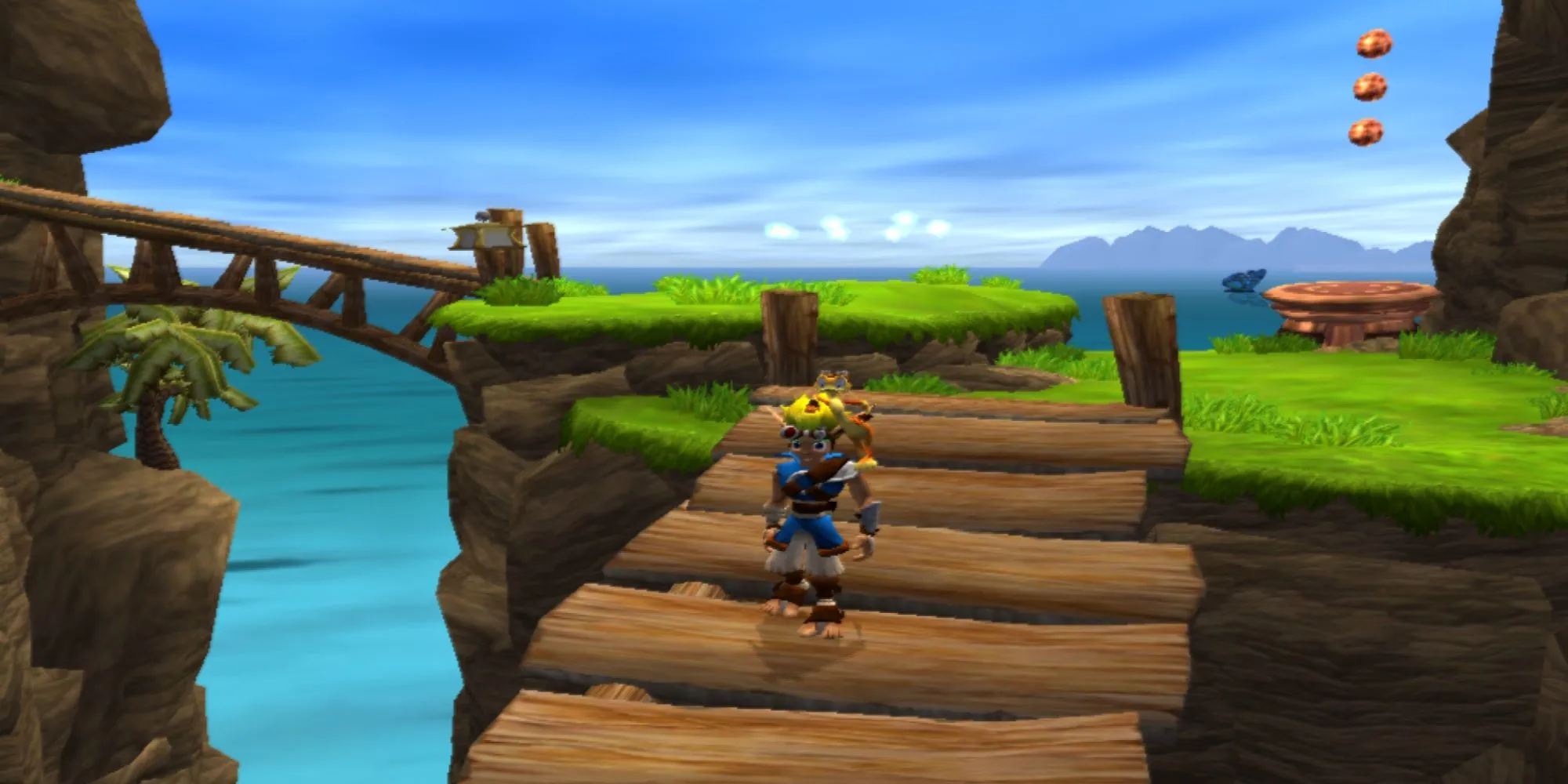 Jak và Daxter đứng ở màn chơi đầu tiên đầy màu sắc và quang đãng trong game hành động phiêu lưu platformer Jak and Daxter: The Precursor Legacy trên PS2.