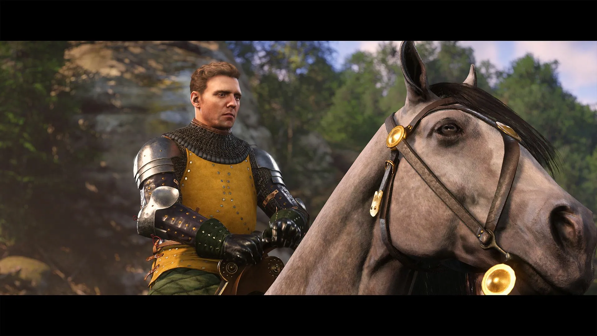 Cảnh một lâu đài hùng vĩ dưới ánh hoàng hôn trong Kingdom Come: Deliverance 2, thể hiện đồ họa tuyệt đẹp