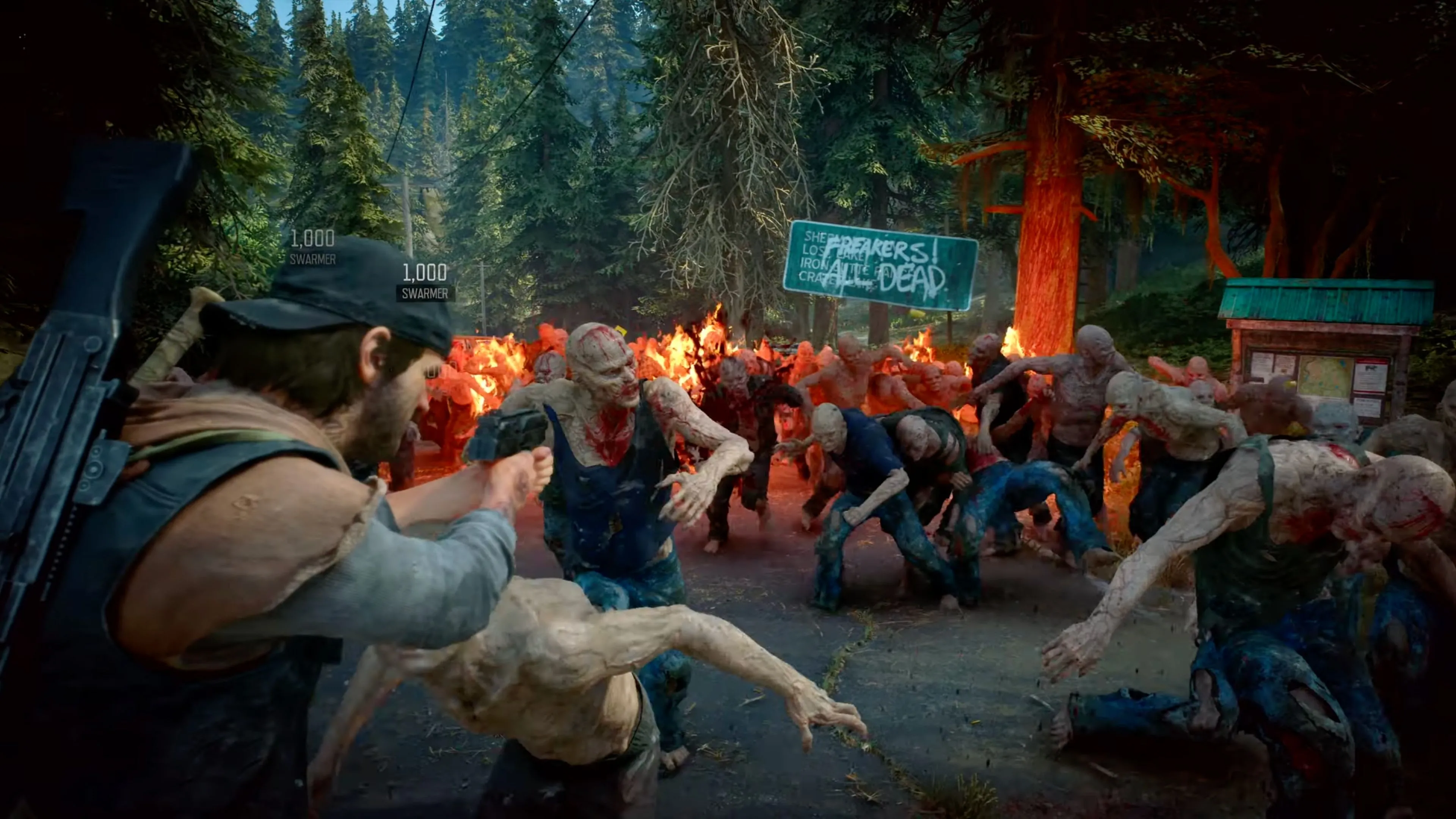 Cảnh trong game Days Gone Remastered, Deacon đang lái mô tô khám phá vùng hoang dã Pacific Northwest