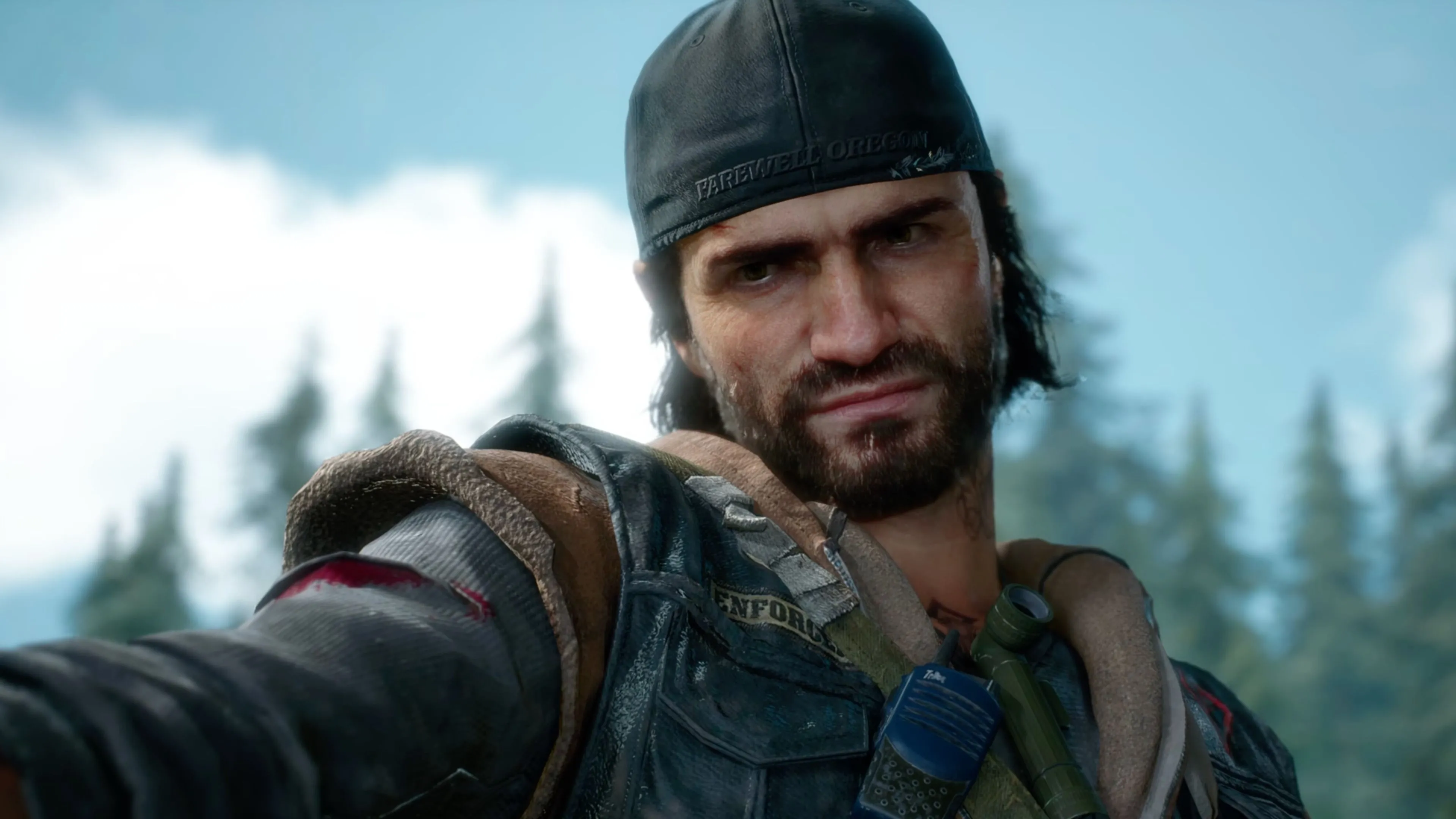 Deacon đối mặt với lũ Freakers đông đảo trong Days Gone Remastered, biểu tượng cho cơ chế sinh tồn căng thẳng