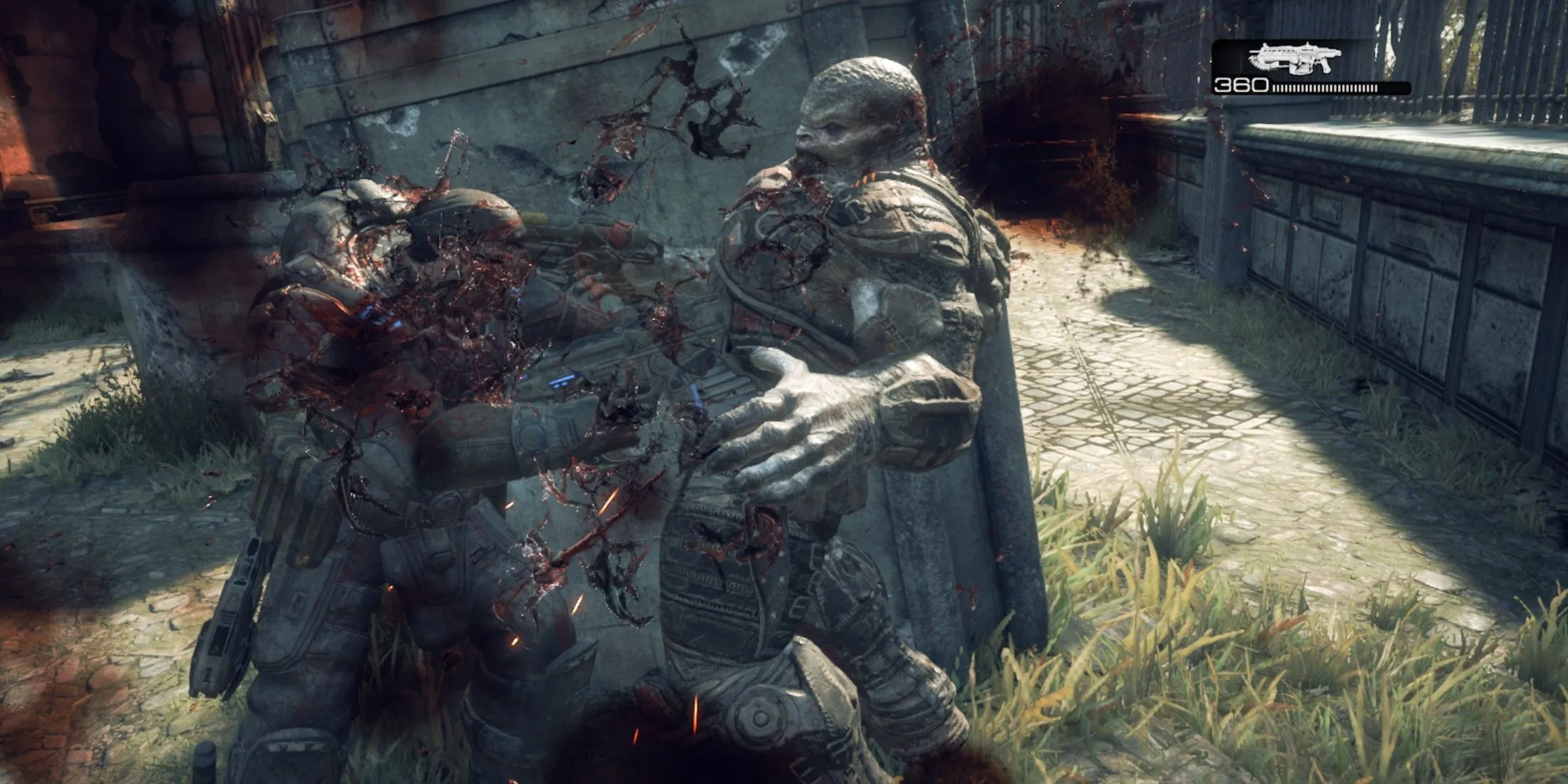 Một khoảnh khắc &quot;cưa máy&quot; đầy kịch tính trong Gears of War: Reloaded, thể hiện gameplay chiến đấu cận chiến đặc trưng