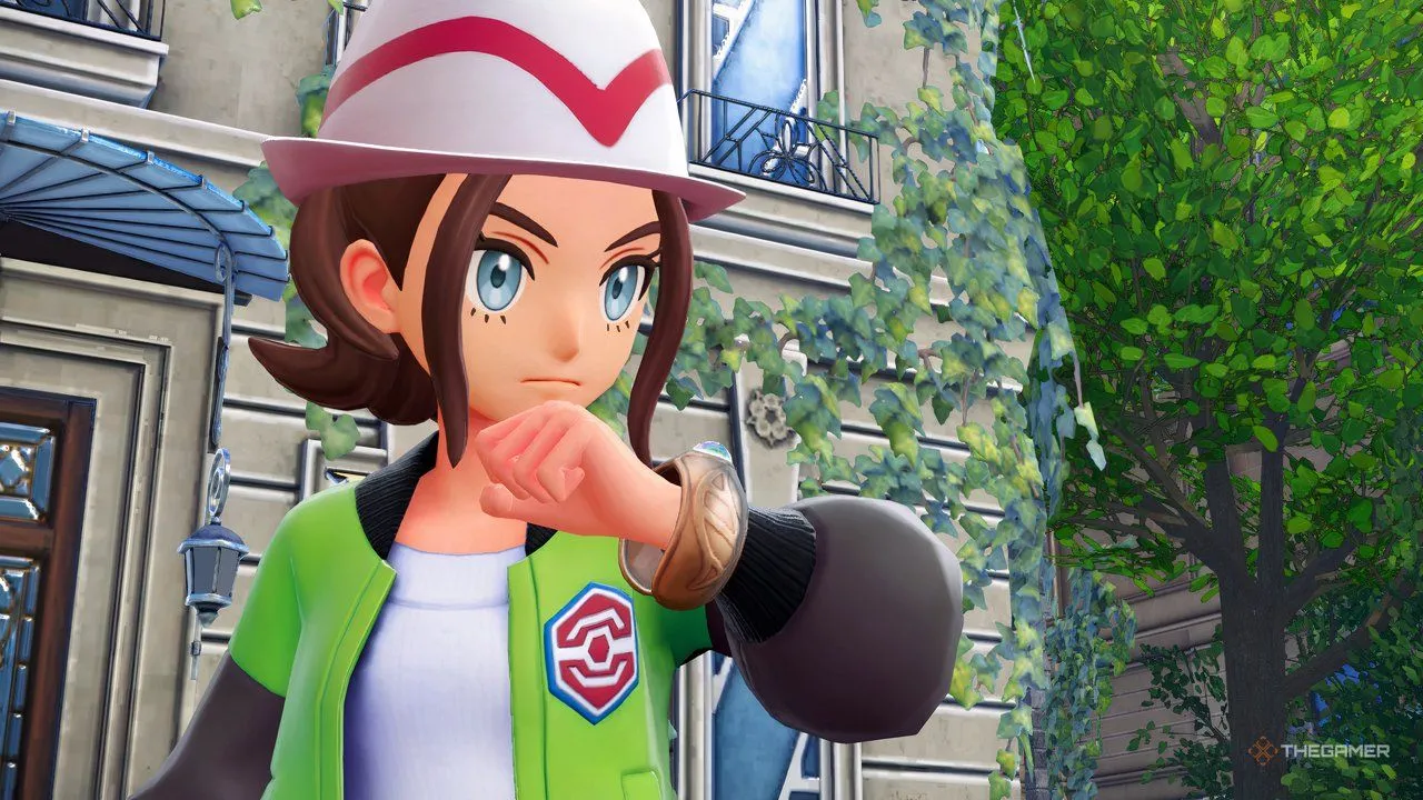 Nhân vật chính khoe **Mega Bracelet** trong Pokemon Legends: Z-A — một chi tiết thiết kế ấn tượng giữa nền đồ họa mở.